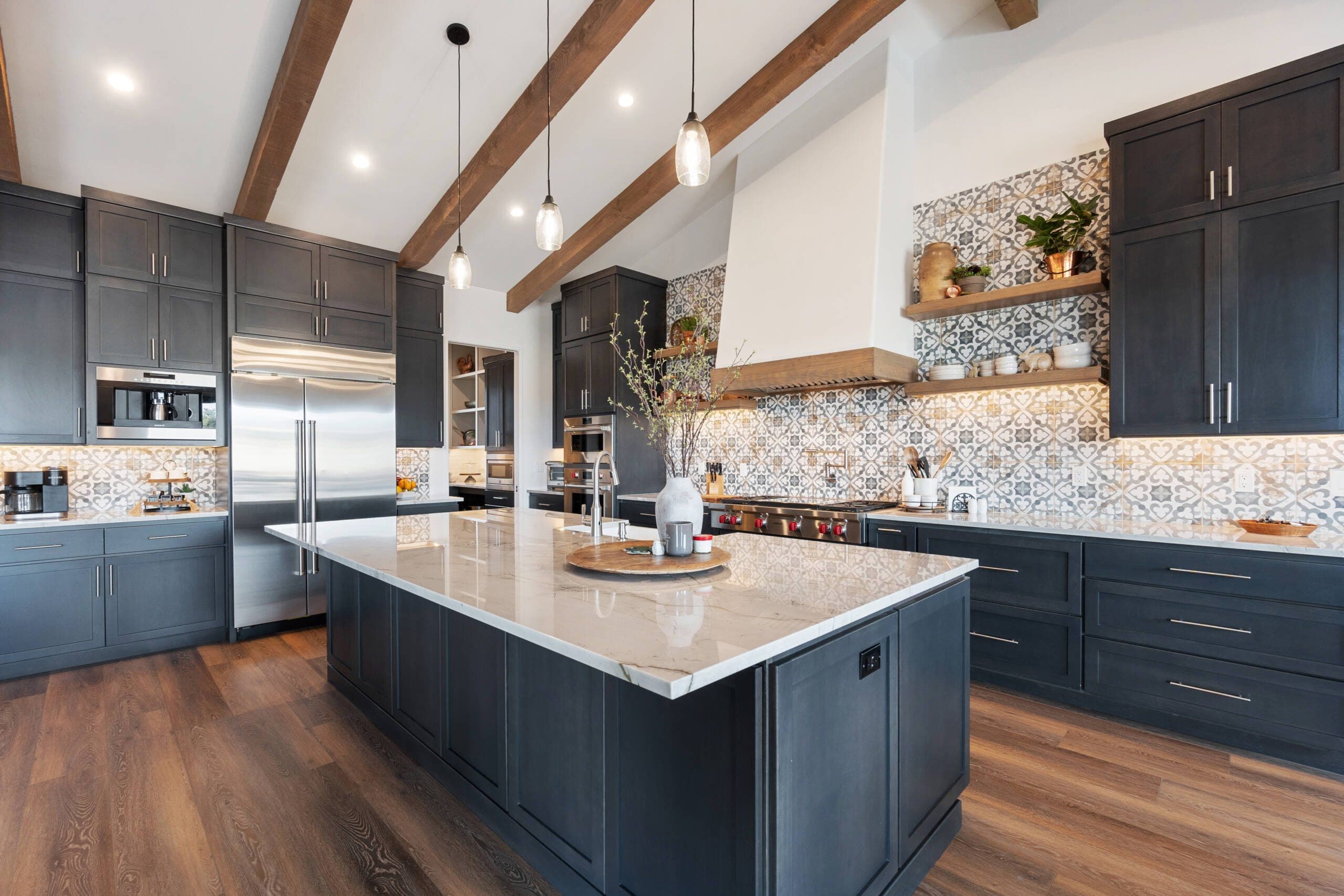 Timeless Argyle kitchen remodel with charcoal shaker cabinets and wood beams